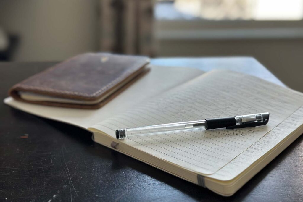 Photo of a journal and pen